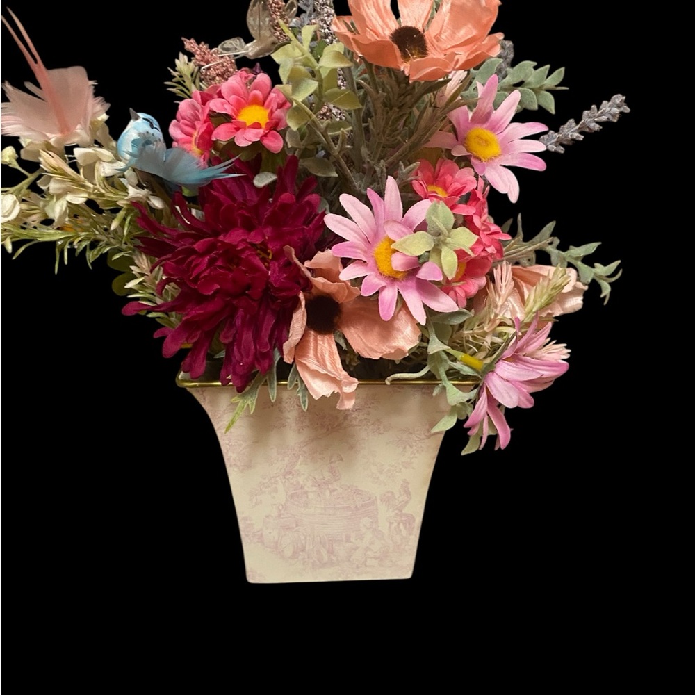 Faux spring variety of flowers and one bird arrangement. Gorgeous flowers!